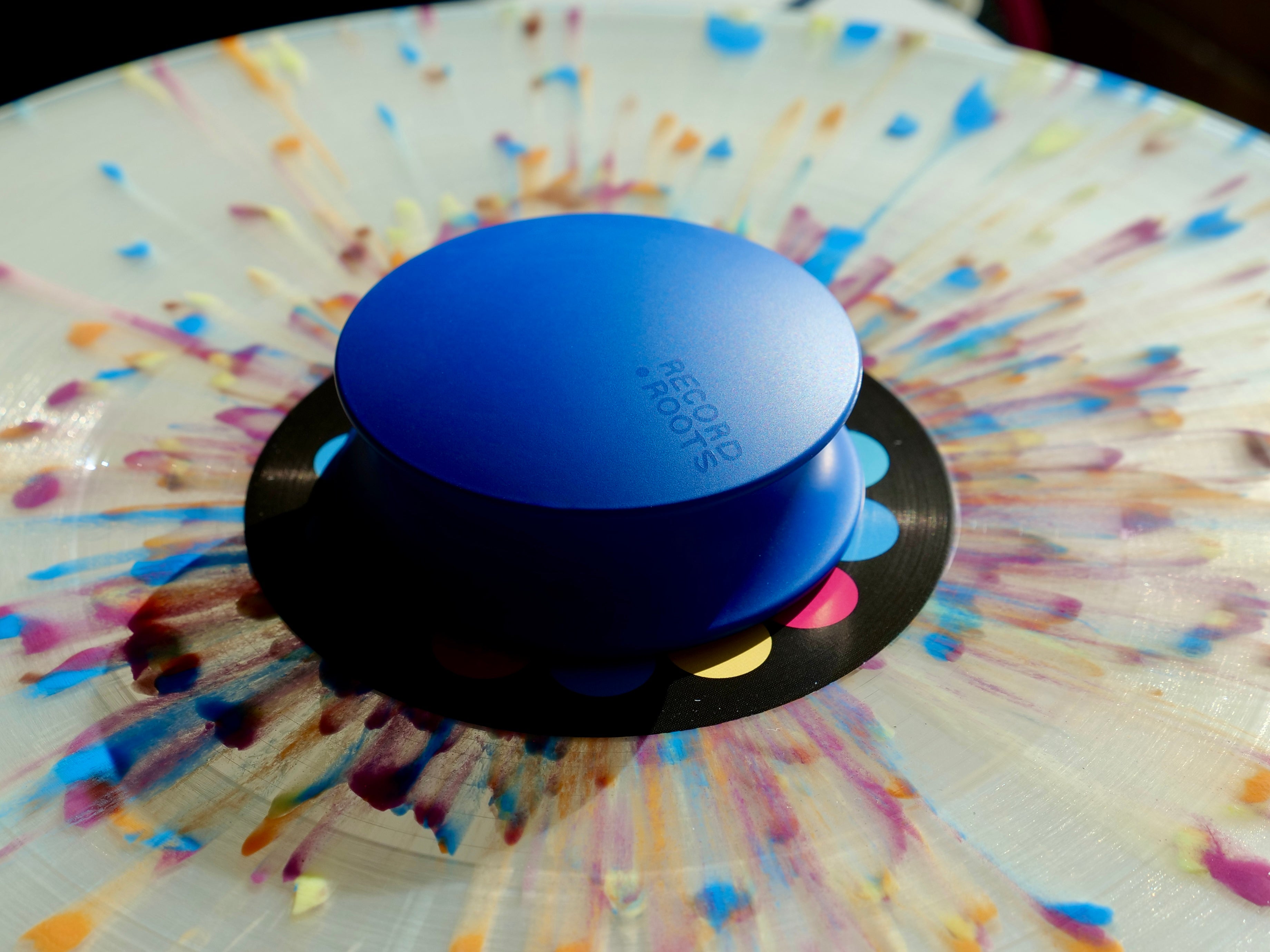 Blue Record Roots record weight on multicoloured splatter vinyl